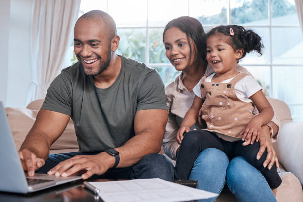 A family researching financial products at home